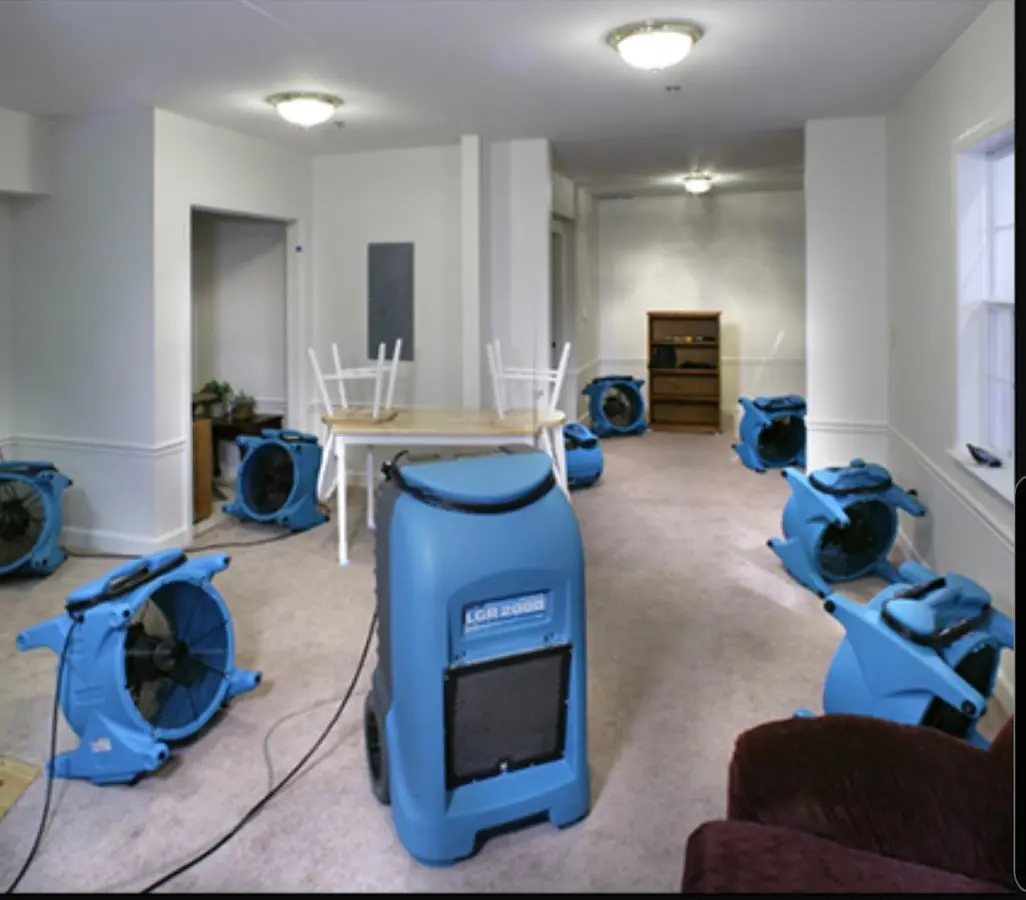 Air movers and dehumidifier setup for Water Damage Restoration in Evansville